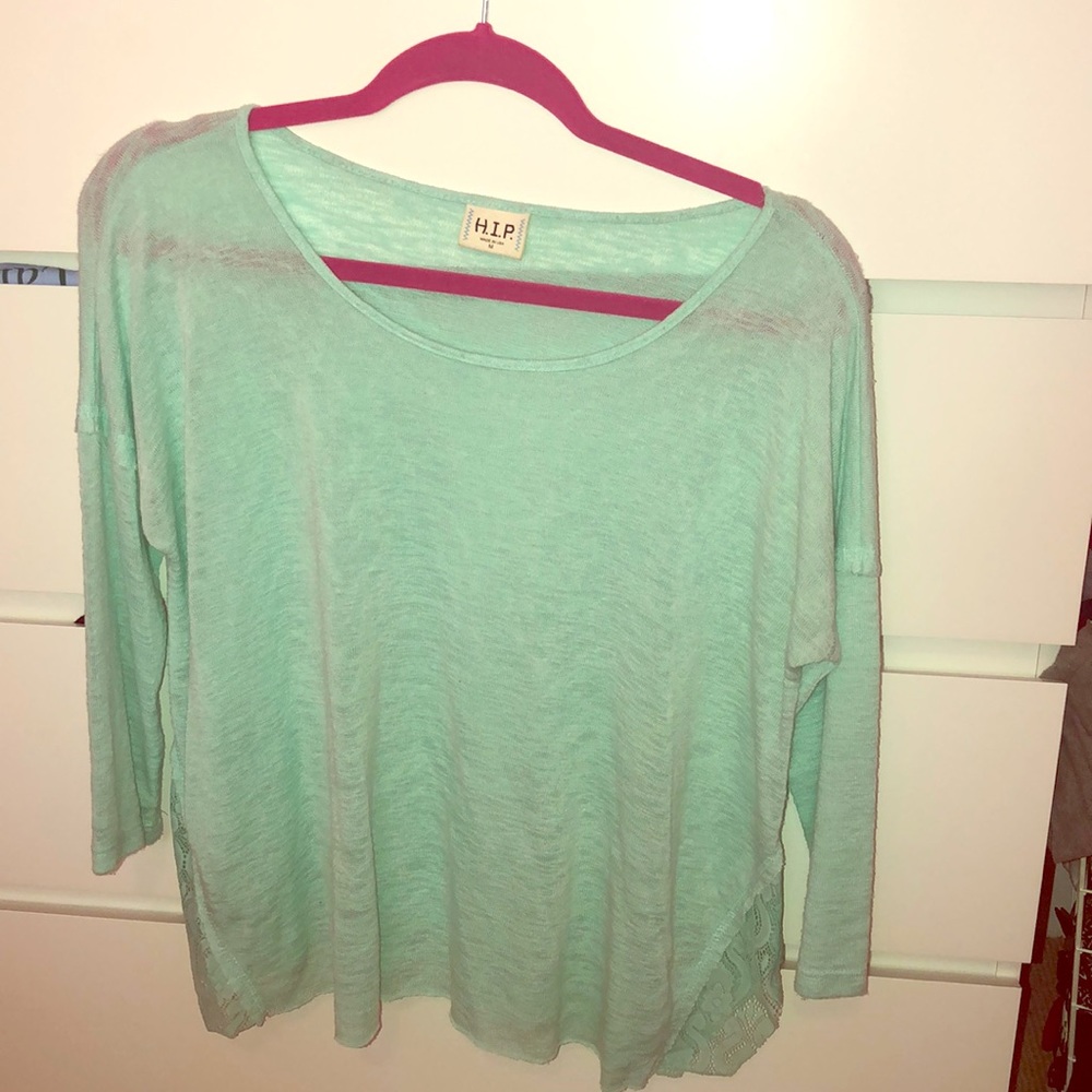 Light blue shirt with cropped sleeves